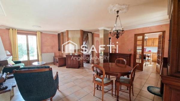 Maison familiale avec jardin arboré, véranda chauffée et chambre de plain-pied