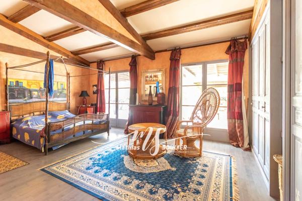 Propriété de 400 m² sur terrain paysagé de 3411m²