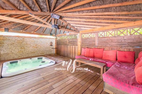 Propriété de 400 m² sur terrain paysagé de 3411m²