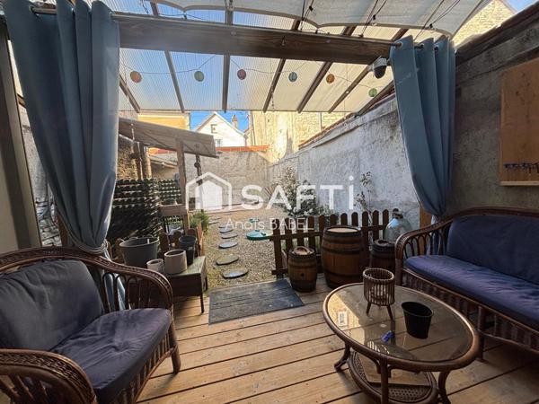 Confort, cour et garages : maison à ne pas manquer