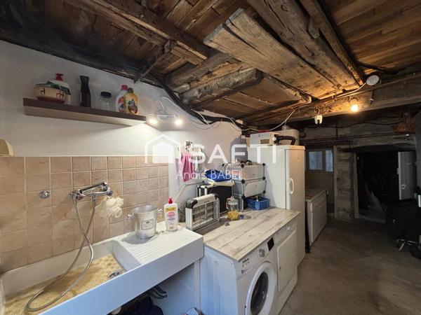 Confort, cour et garages : maison à ne pas manquer