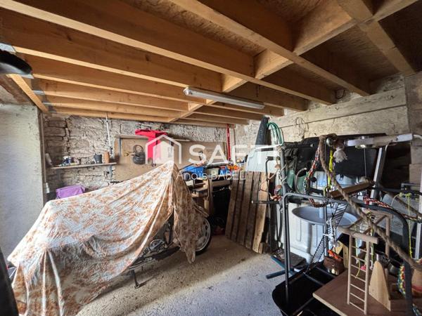 Confort, cour et garages : maison à ne pas manquer