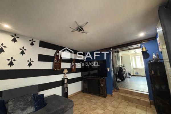 Confort, cour et garages : maison à ne pas manquer