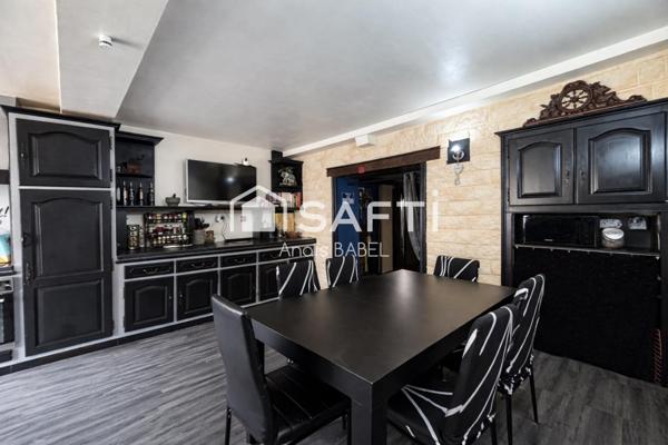 Confort, cour et garages : maison à ne pas manquer