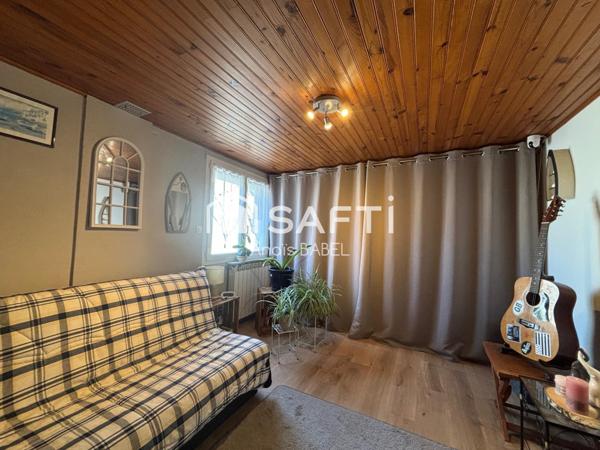 Confort, cour et garages : maison à ne pas manquer