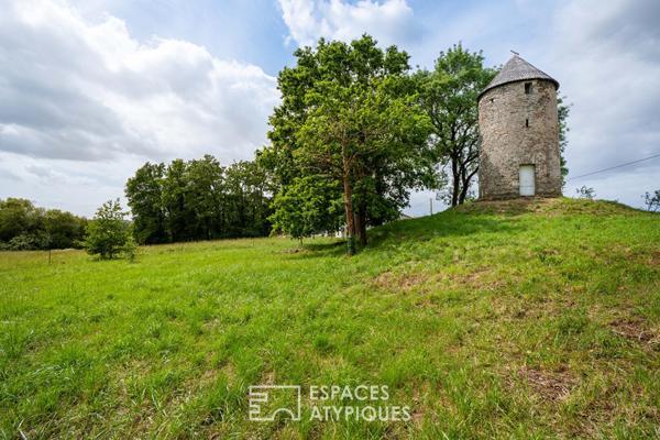 Belle parcelle avec panorama à 360° et ancien moulin à vent