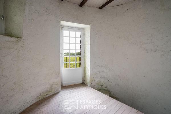 Belle parcelle avec panorama à 360° et ancien moulin à vent