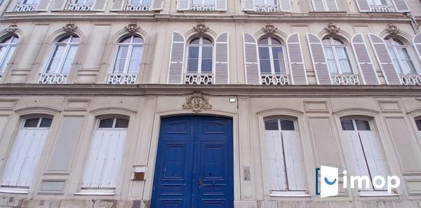 T3 dans un hôtel particulier