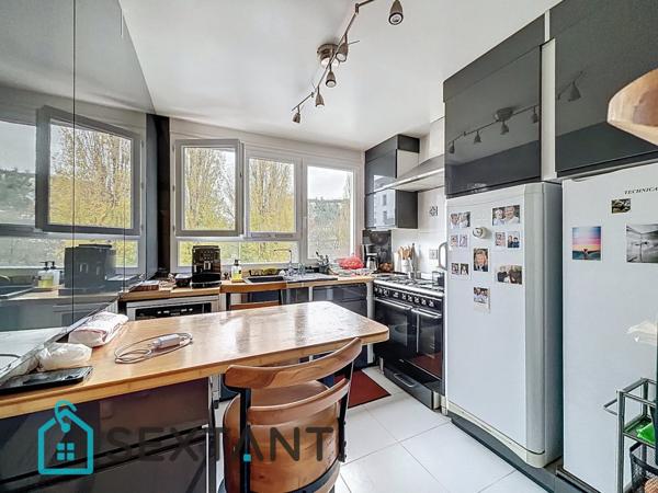 Appartement 87m2, 3 chambres et garage.