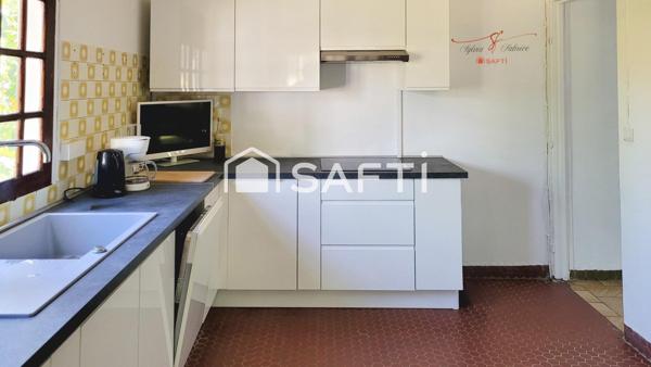 PROPRIÉTÉ AVEC POSSIBILITÉ DE RENDEMENT LOCATIF