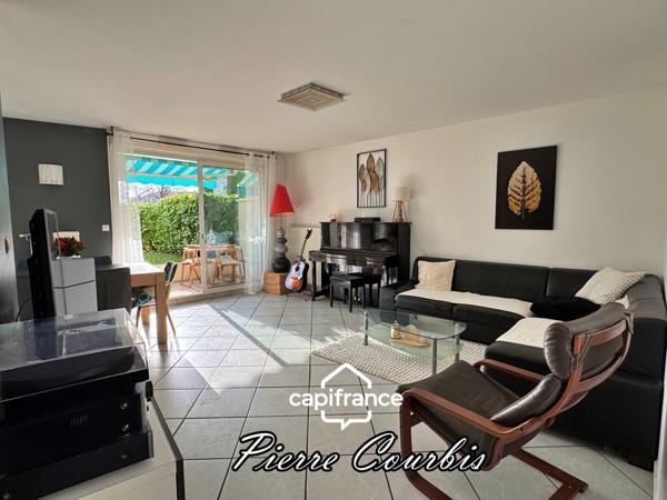 Appartement en rez de jardin avec garage et cave à vendre 3 pièces BRON (69)