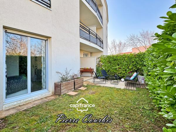 Appartement en rez de jardin avec garage et cave à vendre 3 pièces BRON (69)