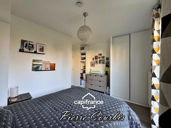 Appartement en rez de jardin avec garage et cave à vendre 3 pièces BRON (69)