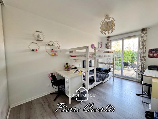 Appartement en rez de jardin avec garage et cave à vendre 3 pièces BRON (69)