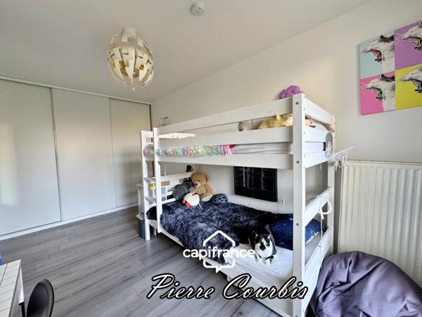 Appartement en rez de jardin avec garage et cave à vendre 3 pièces BRON (69)