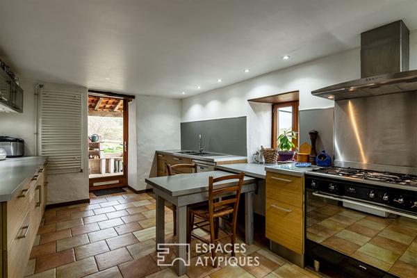 Ancien corps de ferme réhabilité dans un environnement naturel préservé