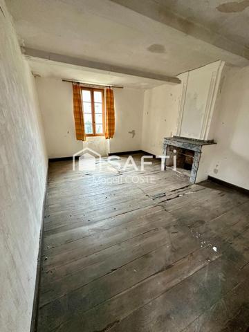 Bien atypique de plus de 350m² au cœur du village