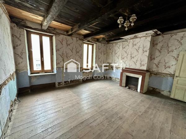 Bien atypique de plus de 350m² au cœur du village