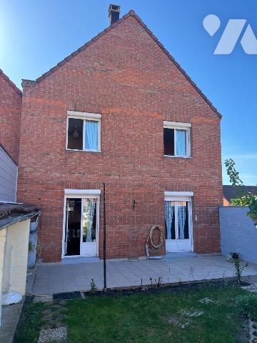 Coudekerque-Branche (59210), maison de ville 1 mitoyenneté construite en 1985 dans un quartier ...