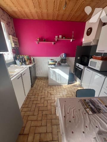 Coudekerque-Branche (59210), maison de ville 1 mitoyenneté construite en 1985 dans un quartier ...