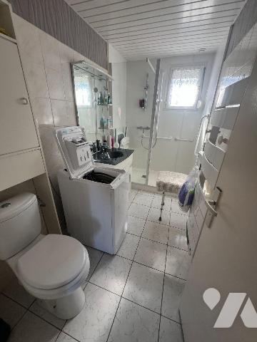 Coudekerque-Branche (59210), maison de ville 1 mitoyenneté construite en 1985 dans un quartier ...