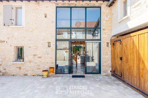 Vieilles pierres, volumes et piscine au coeur de Vernouillet