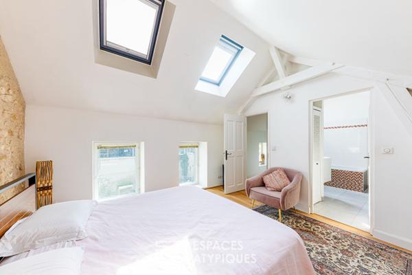 Vieilles pierres, volumes et piscine au coeur de Vernouillet