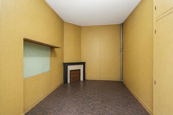 Appartement familial de 109 m² avec balcon et 3 chambres, immeuble en pierre de taille, Paris XVIIe