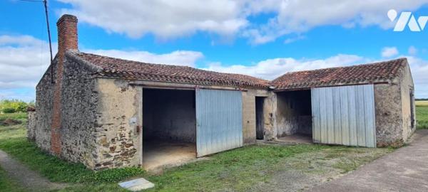 Grange en pierre de 110 m² à réhabiliter en habitation sur un terrain de 614 m²