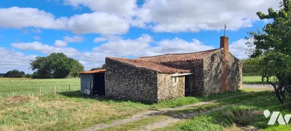 Grange en pierre de 110 m² à réhabiliter en habitation sur un terrain de 614 m²