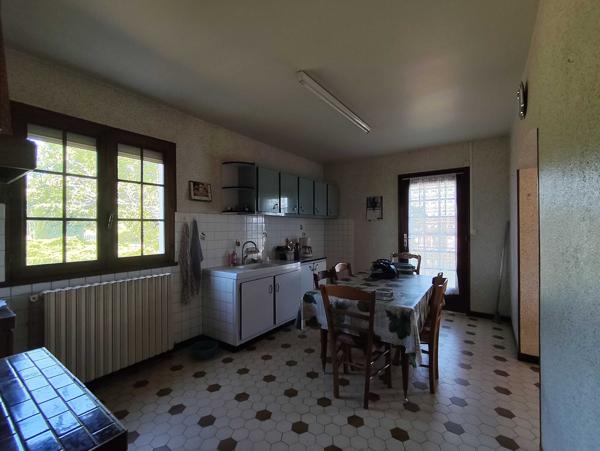 MAISON SUR SOUS SOL AVEC TERRAIN ET VERGER