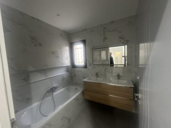 Villa plain pied de 104m2 habitable sur un terrain 3 faces avec garage