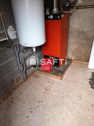 cachet de la maison par ses jolies briques et poutres de son entrée