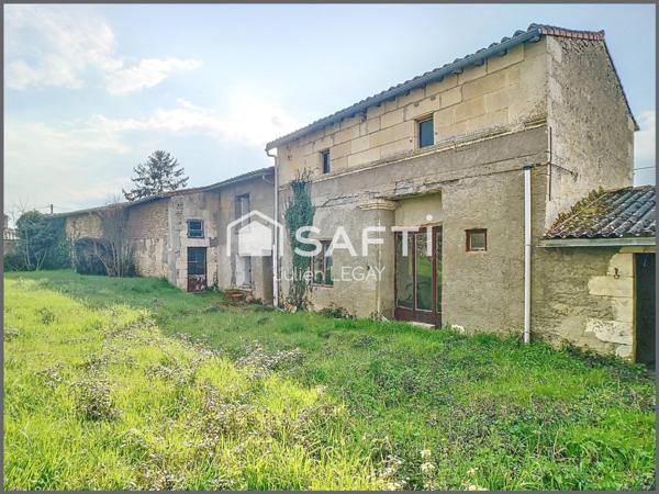 MAISON A RENOVER AVEC BEAU POTENTIEL, GARAGE ET JARDIN