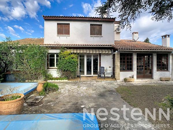 Maison T6 de 169 m² avec jardin et piscine