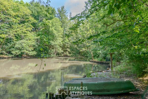 Propriété d’exception avec étang, piscine et pool house en pierre