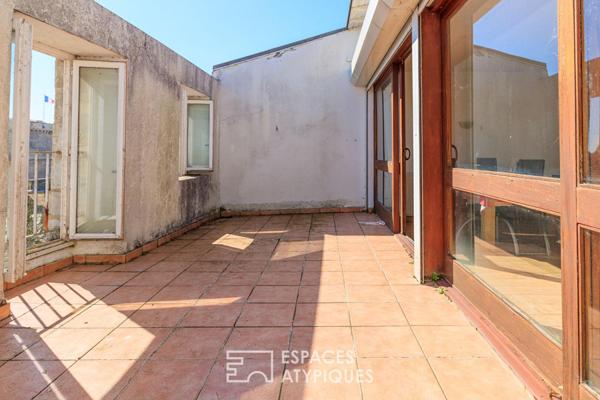 Appartement-terrasse à rénover avec sa vue sur les tours
