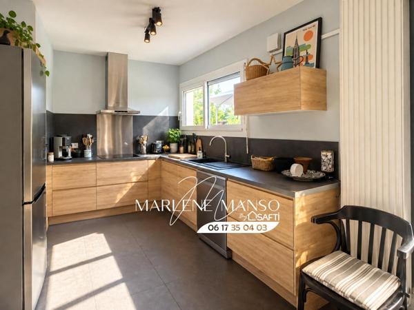 Maison avec garage, jardin et piscine au calme