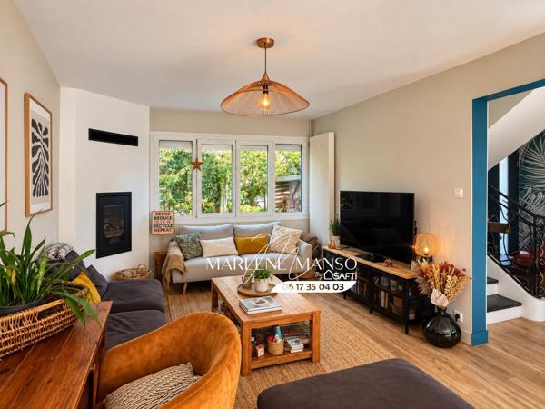 Maison avec garage, jardin et piscine au calme