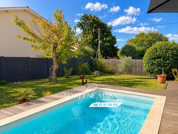 Maison avec garage, jardin et piscine au calme