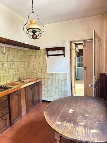 Léguevin.Maison de village à rénover.