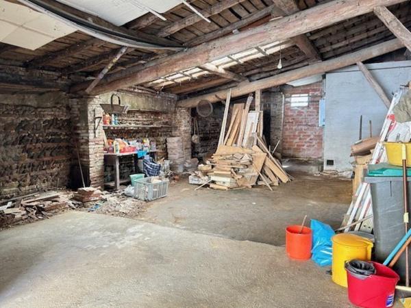 Léguevin.Maison de village à rénover.