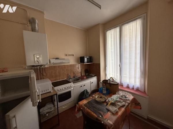 APPARTEMENT DE TYPE IV TRAVAUX INVESTISSEUR  INTRA MUROS ASCENSSEUR + CAVE 