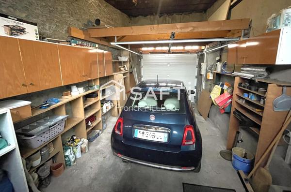 Belle maison avec garage, cour fermée et carport