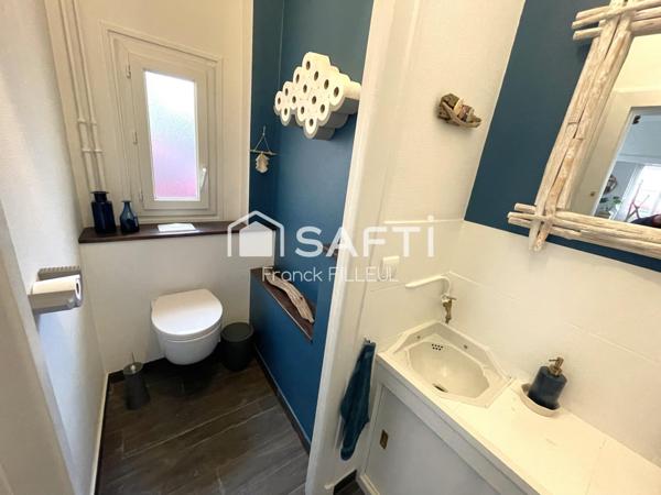 Belle maison avec garage, cour fermée et carport