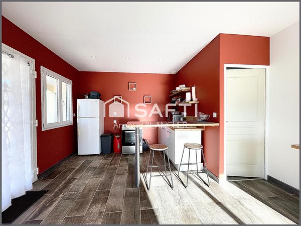 Investissement locatif, pavillon plain-pied actuellement loué, 2 chambres, cellier, garage, jardin clos.