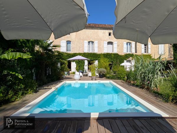 Belle propriété de ville en pierre avec jardin, piscine et potentiel proche CASTELJALOUX