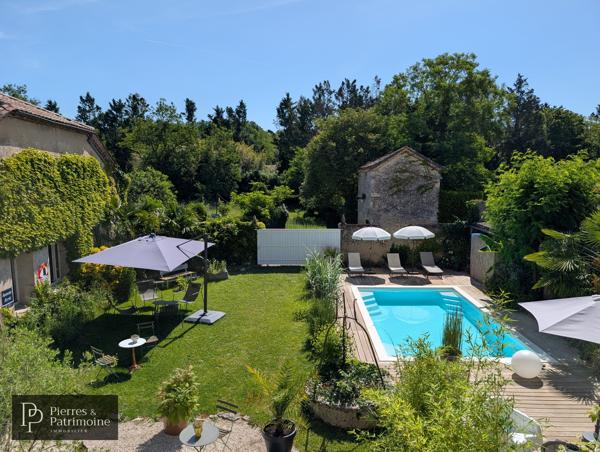 Belle propriété de ville en pierre avec jardin, piscine et potentiel proche CASTELJALOUX