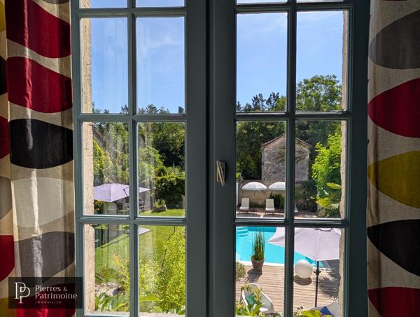 Belle propriété de ville en pierre avec jardin, piscine et potentiel proche CASTELJALOUX
