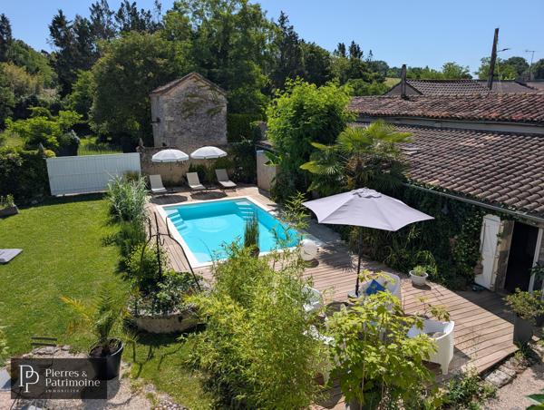 Belle propriété de ville en pierre avec jardin, piscine et potentiel proche CASTELJALOUX